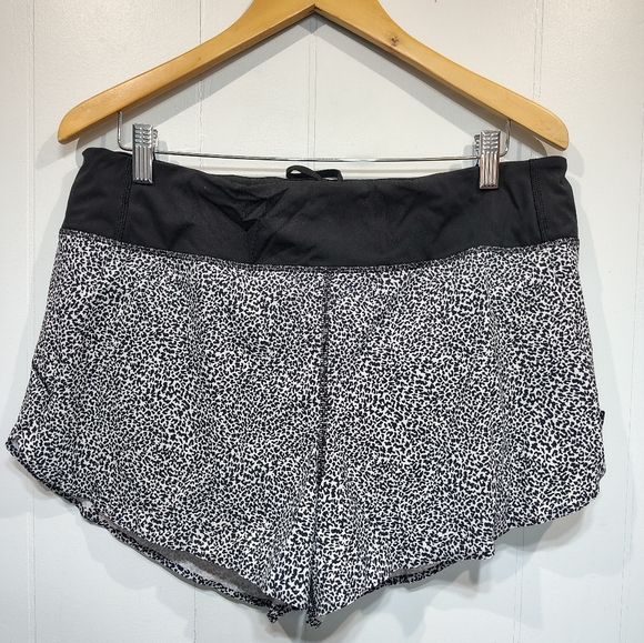 Athleta Pants - Athleta Stellar Flare Trouser Shorts L Black White Leopard Print‎ Running Gym